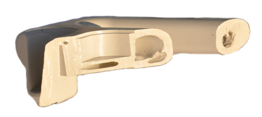 An example of part for a keyboard molded with internal gas assist
