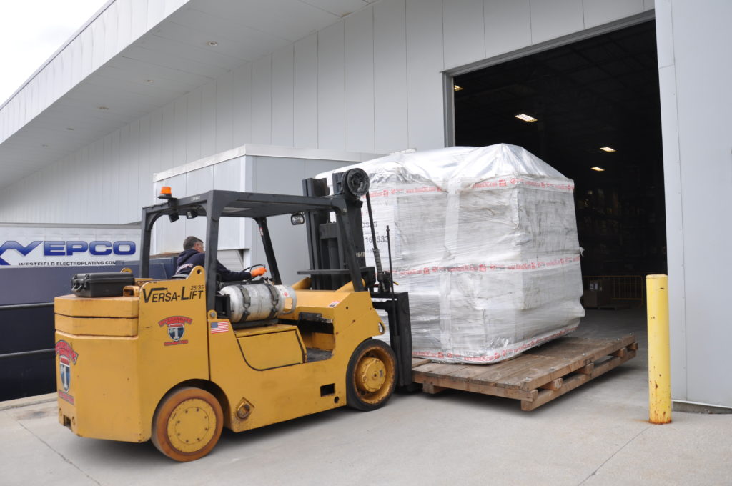 Image showing one of two new Haas three-axis machining centers is brought into Mack Molding’s Headquarters via a forklift in Arlington, Vt., on Monday, May 4, 2020. 