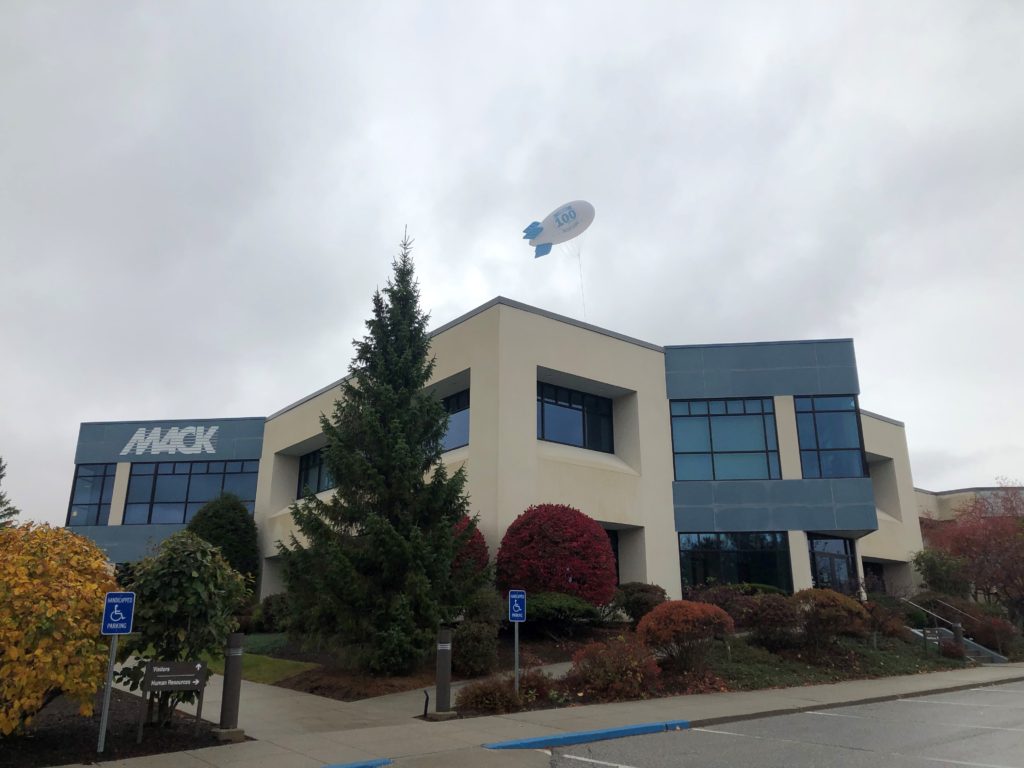 100th Anniversary Blimp flies over Mack HQ